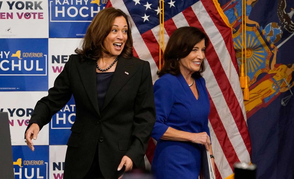 Vice President Kamala Harris and Gov. Kathy Hochul stand on stage during a "Get Out the Vote" rally at Manhattan