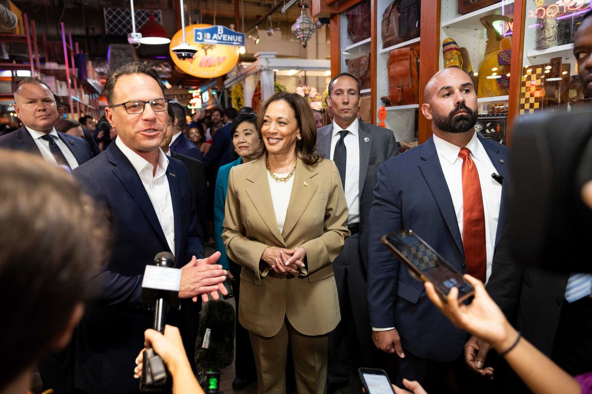Vice President Kamala Harris and Pennsylvania Gov. Josh Shapiro speak to the press while making a stop at the Reading Terminal Market in Philadelphia, Pennsylvania, July 13, 2024.