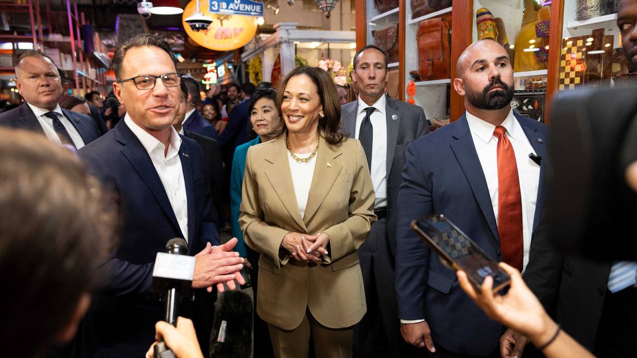 Vice President Kamala Harris and Pennsylvania Gov. Josh Shapiro speak to the press while making a stop at the Reading Terminal Market in Philadelphia, Pennsylvania, July 13, 2024.