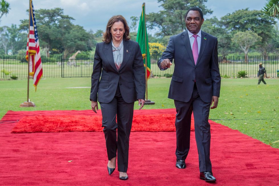 Vice President Kamala Harris (L) and Zambian President Hakainde Hichilema are seen at the State House in Lusaka on March 31, 2023 after a press conference