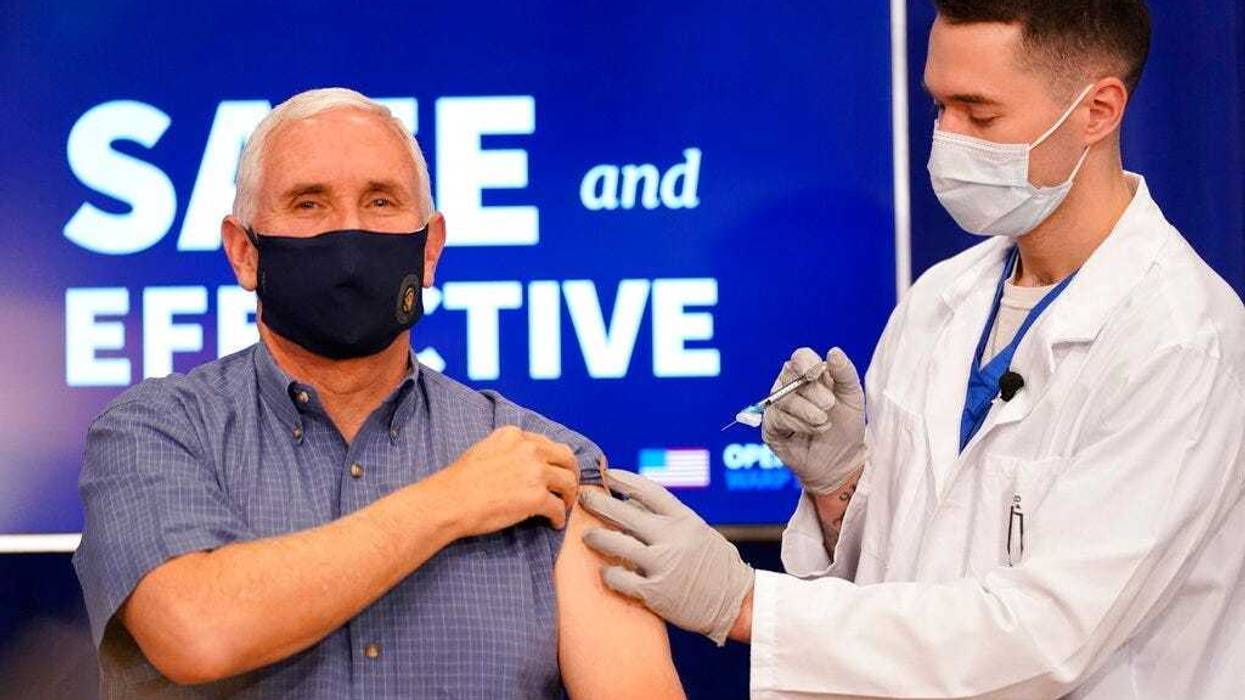 Vice President Mike Pence receives a Pfizer-BioNTech COVID-19 vaccine shot at the Eisenhower Executive Office Building on the White House complex, Friday, Dec. 18, 2020, in Washington.