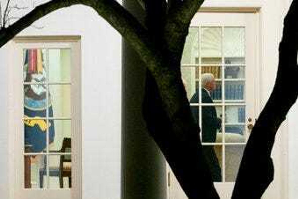 Vice President Mike Pence walks through the Oval Office before President Donald Trump departs the White House in Washington, Monday, Jan. 4, 2021. (AP Photo/Andrew Harnik)