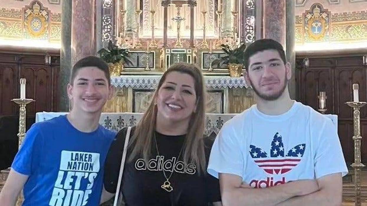 Victim Katrina Michael of Warren is pictured, with her two sons