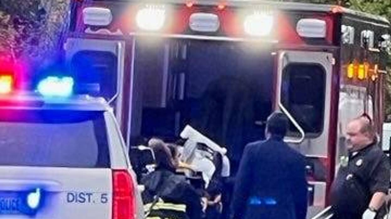 Victim of the assault is being loaded into an ambulance at N. Euclid and West Pine on October 29th, 2023.