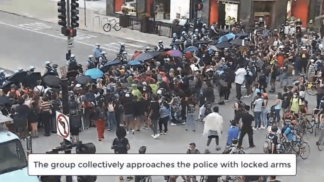 VIDEO: Officer Hit In Head With Skateboard During Downtown Protest