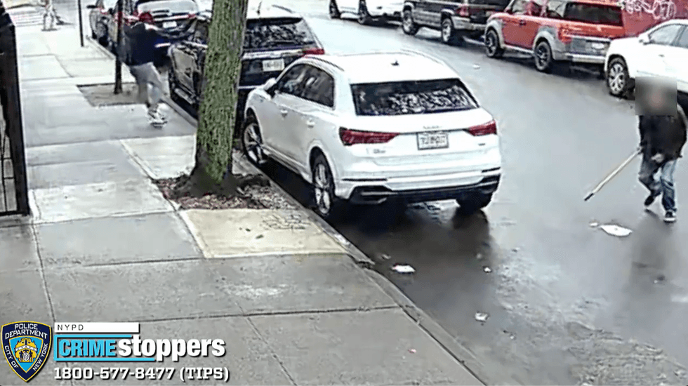 Video shows a man with a rod dodging a gunman
