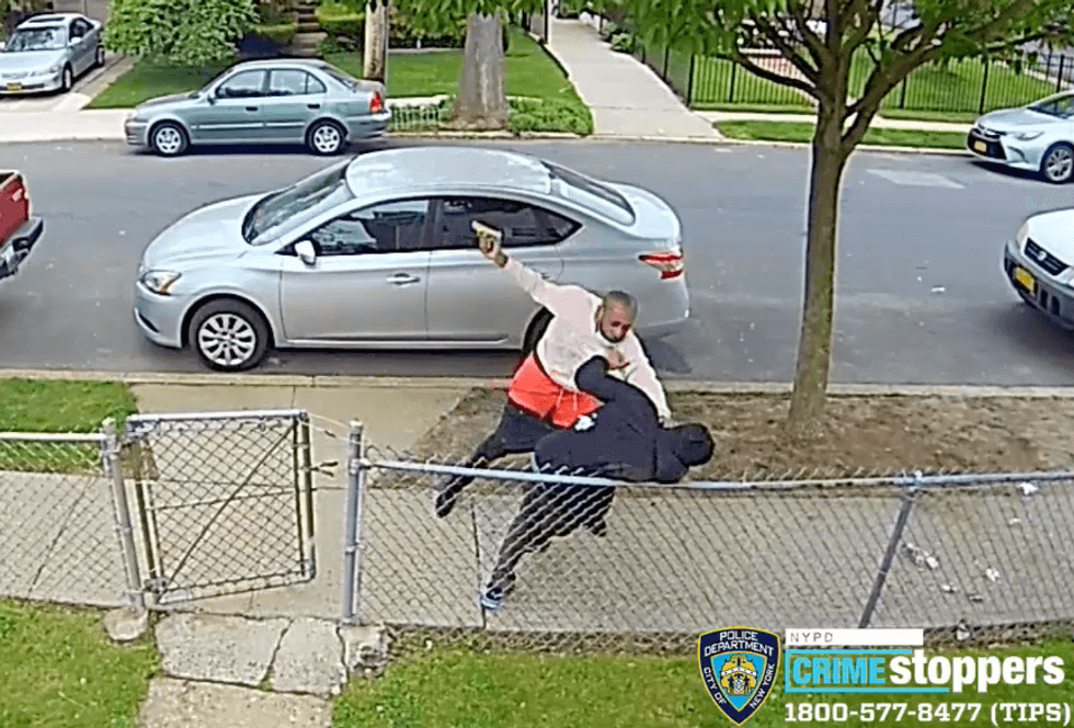 Video shows the suspect repeatedly hitting the victim with a gun on a street in Queens Village on May 13