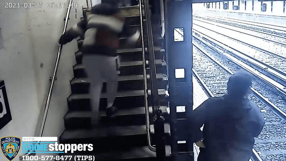 Video shows the suspect running up a staircase after the theft