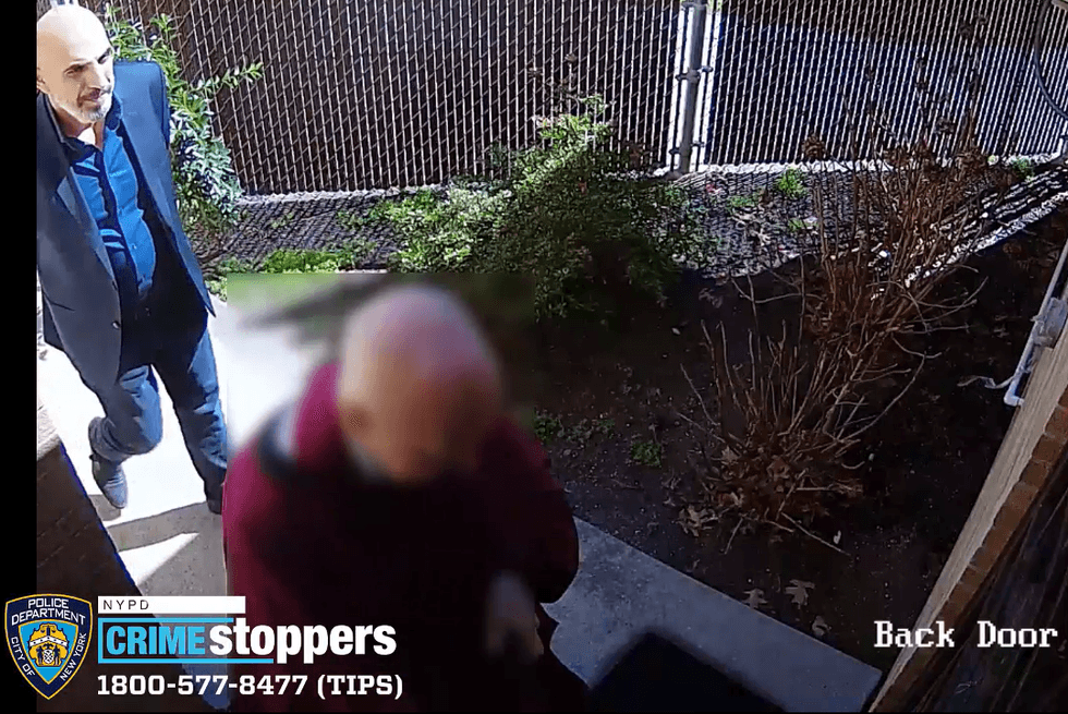 Video shows the suspect walking into the church Sunday before afternoon Mass