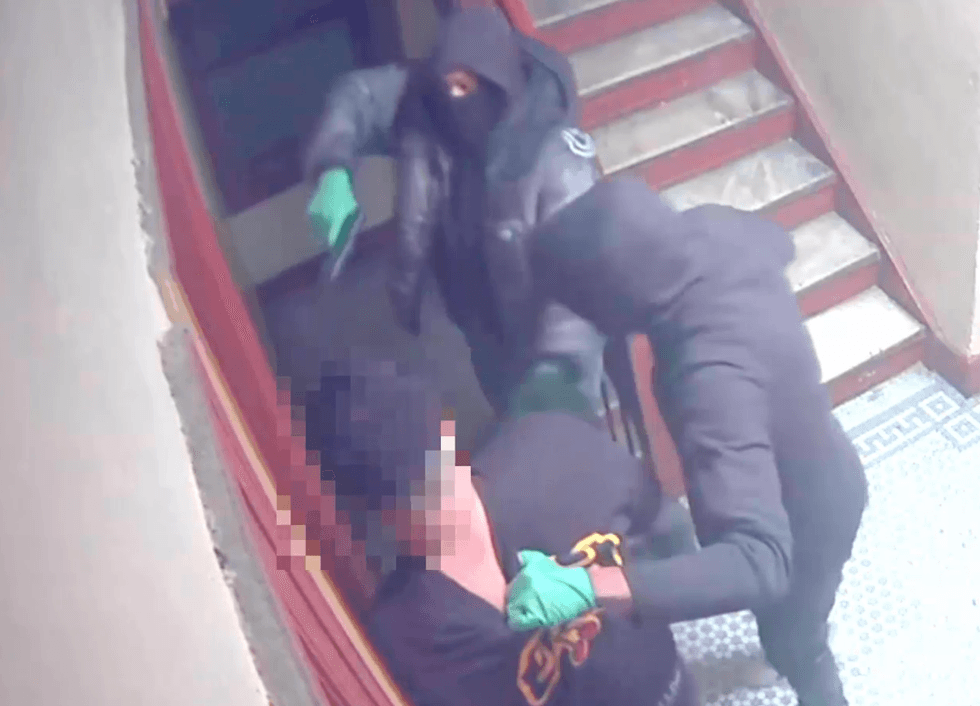 Video shows the victim being held at gunpoint in a stairwell