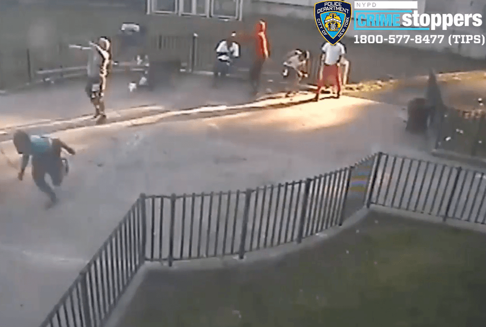 Video shows two men opening fire in the courtyard at the Redfern Houses in Far Rockaway on Monday