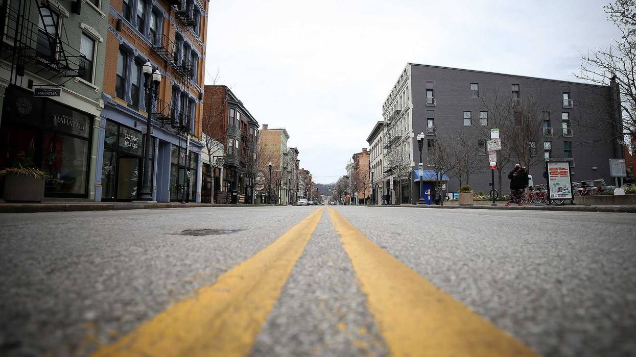 View looking north of Vine Street, Tuesday, March 24, 2020, in Cincinnati's Over-the-Rhine neighborhood. Tuesday was the first day of Ohio Gov. Mike DeWine's shelter-in-place order in response to the new coronavirus pandemic. All non-essential businesses
