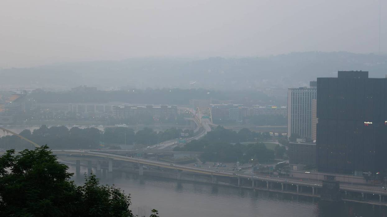 View of downtown district with poor air quality and haze caused by Canadian wildfire smoke, Pittsburgh, PA