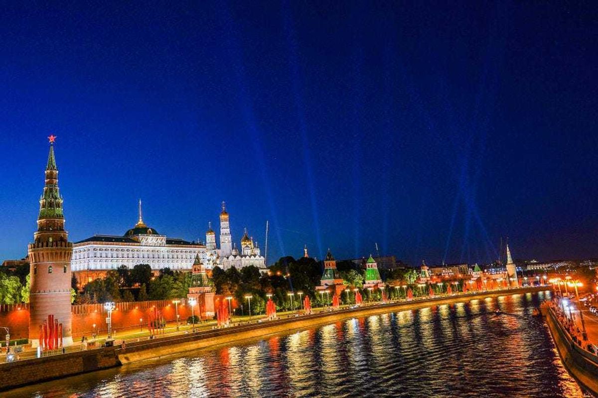 View of the Moscow Kremlin and the Moskva River from the Bolshoi Kamenny Bridge during the Rays of Victory event on June 24,2020 in Moscow,Russia.