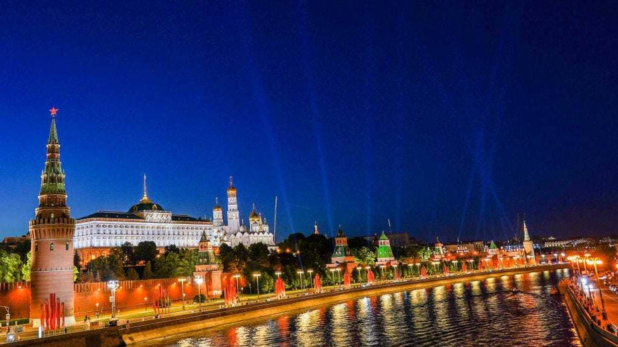 View of the Moscow Kremlin and the Moskva River from the Bolshoi Kamenny Bridge during the Rays of Victory event on June 24,2020 in Moscow,Russia.