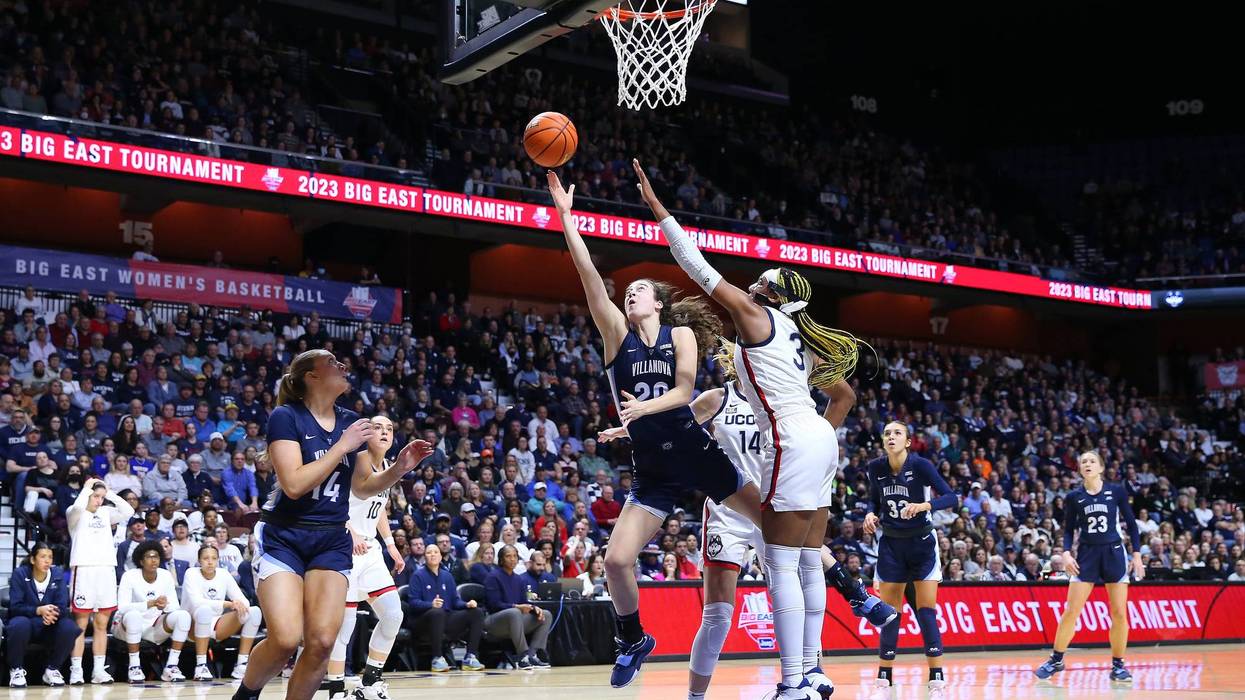 Villanova Wildcats forward Maddy Siegrist (20) drives to the basket against UConn Huskies forward Aaliyah Edwards (3) during the Big East Women's Basketball Tournament championship game between Villanova Wildcats and UConn Huskies on March 6, 2023, at Mohegan Sun Arena in Uncasville, Connecticut.