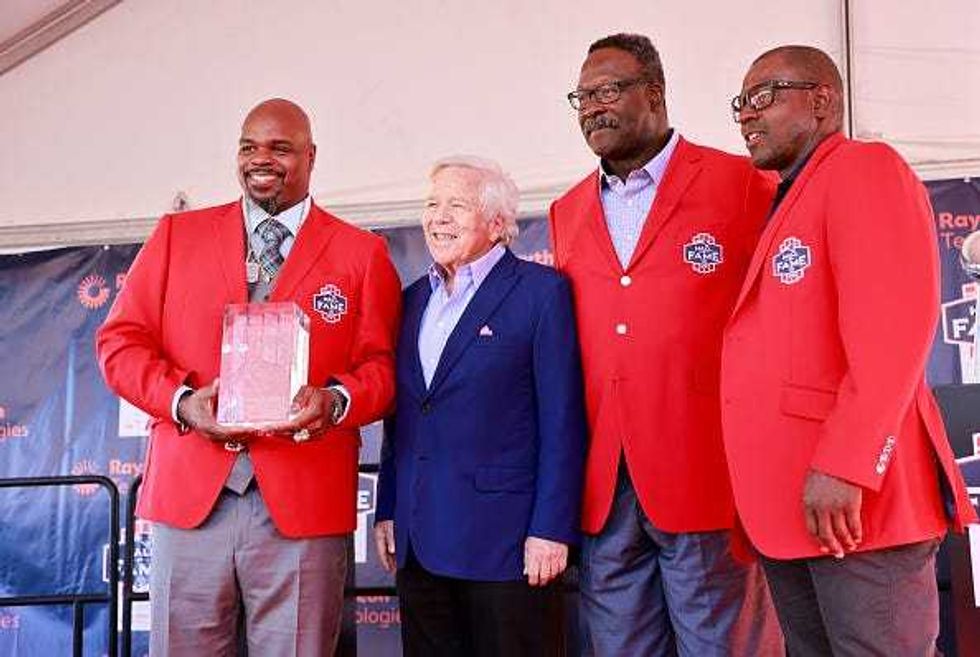 Vince Wilfork, Robert Kraft, Andre Tippett and Troy Brown