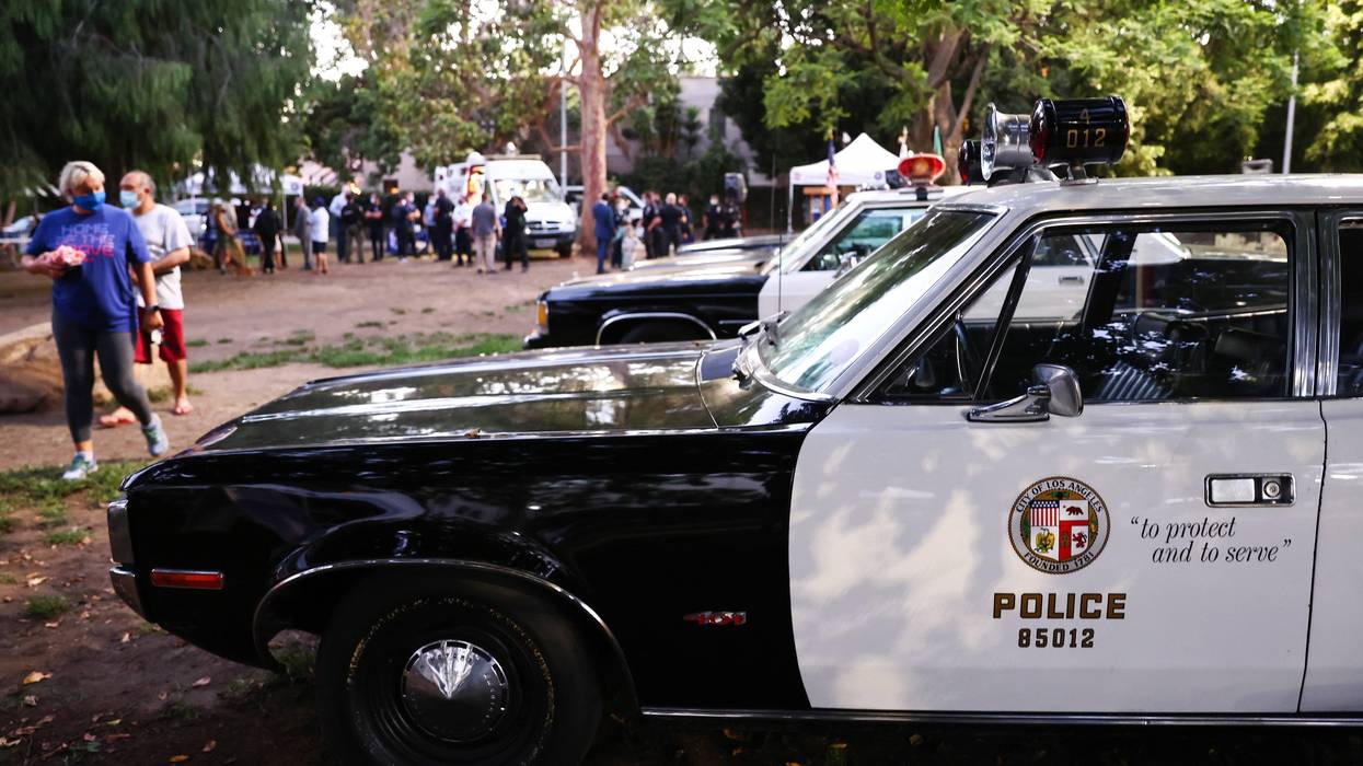 Vintage Los Angeles Police Department (LAPD) vehicles are displayed during a National Night Out event hosted by Melrose Action on August 03, 2021 in Los Angeles, California.