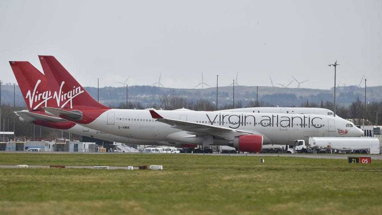 Virgin Atlantic planes sit on the runway at Glasgow Airport on March 21, 2020 in Glasgow, Scotland.