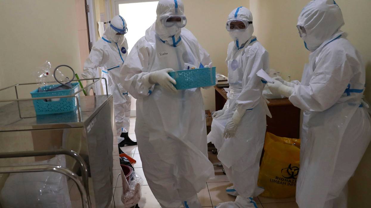 Virus Outbreak Indonesia Doctors