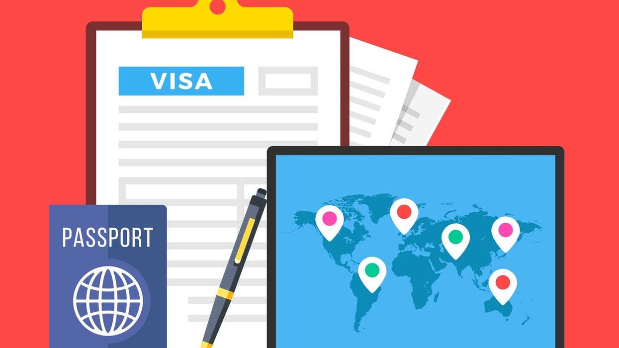 Visa application. Clipboard with visa application form, passport, pen and laptop with map of the world and map markers.