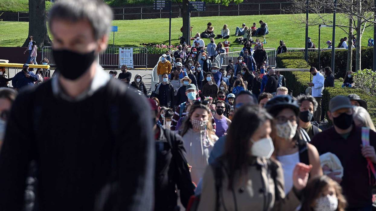 Visitors embark on a ferry after visiting Governors Island on opening day, New York, NY, May 1, 2021