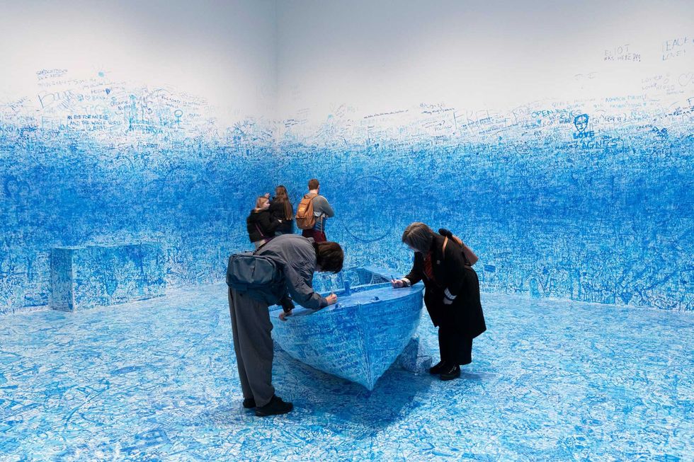 Visitors explore Yoko Ono