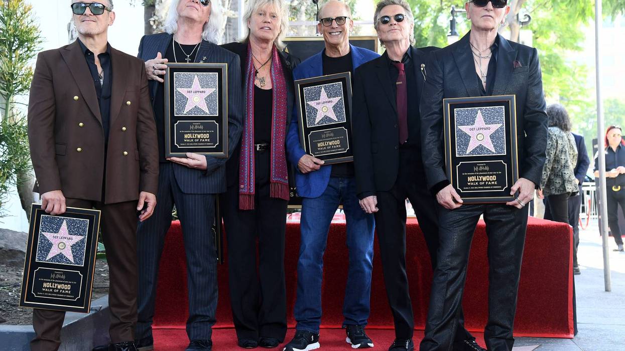 Vivian Campbell, Joe Elliott, Rick Savage, Bruce Resnikoff, Rick Allen and Phil Collen attend Def Leppard Honored With Star On Hollywood Walk Of Fame on October 09, 2025 in Hollywood, California.
