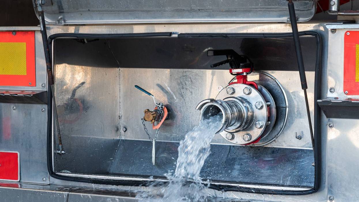 Volunteer fire official charged with DUI after tanker crash with child on board