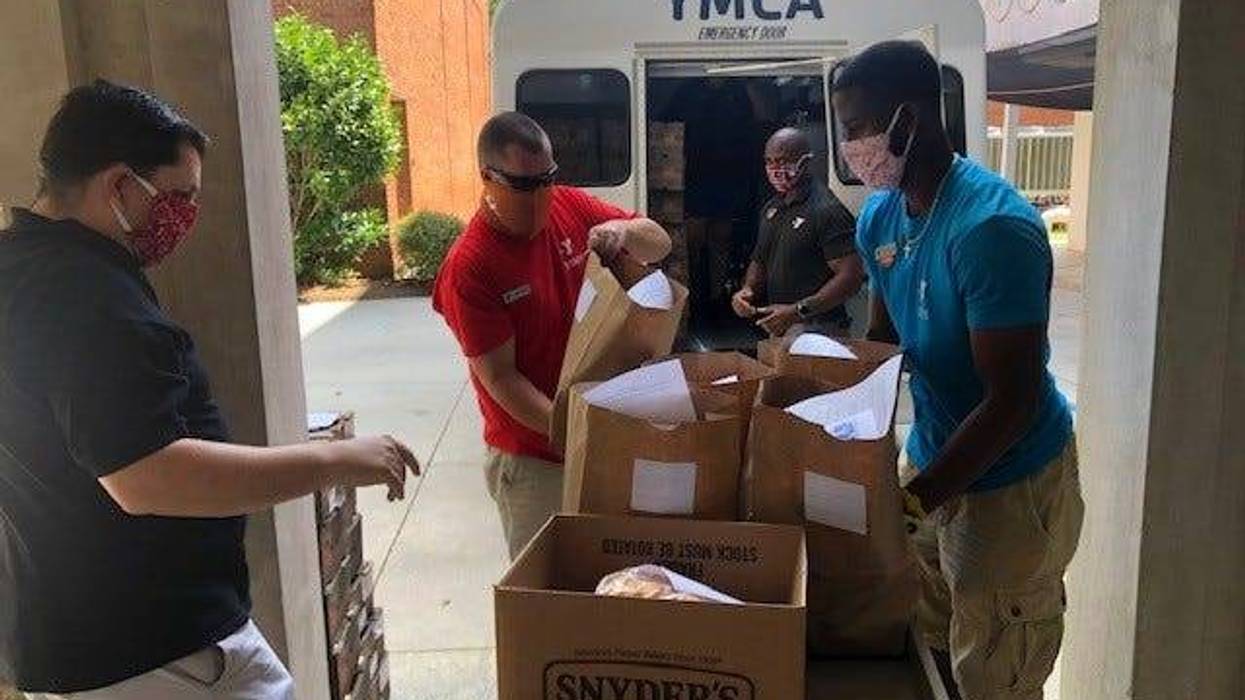 Volunteers packing food at YMCA of Greenville