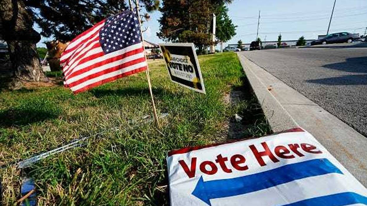 vote here sign on the ground