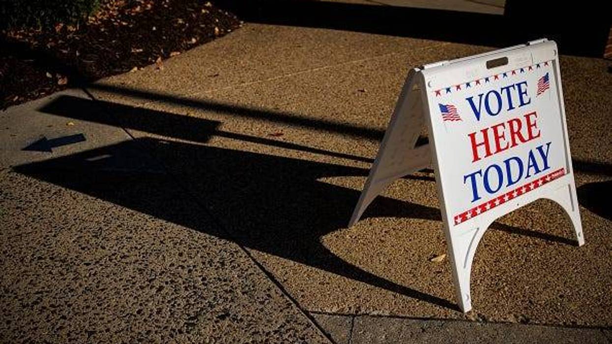 Vote here sign