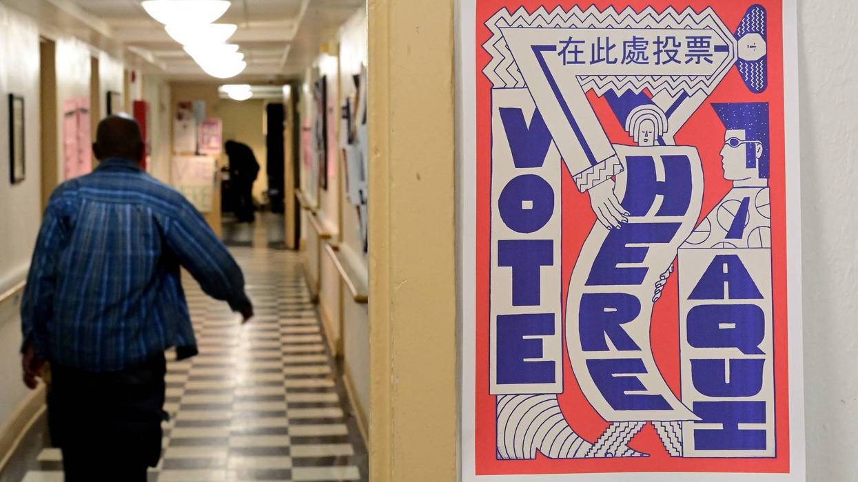 Voters arrive to cast their ballots at the Kendell Arms polling location on November 8, 2022 in Philadelphia, Pennsylvania. After months of candidates campaigning, Americans are voting in the midterm elections to decide close races across the nation.