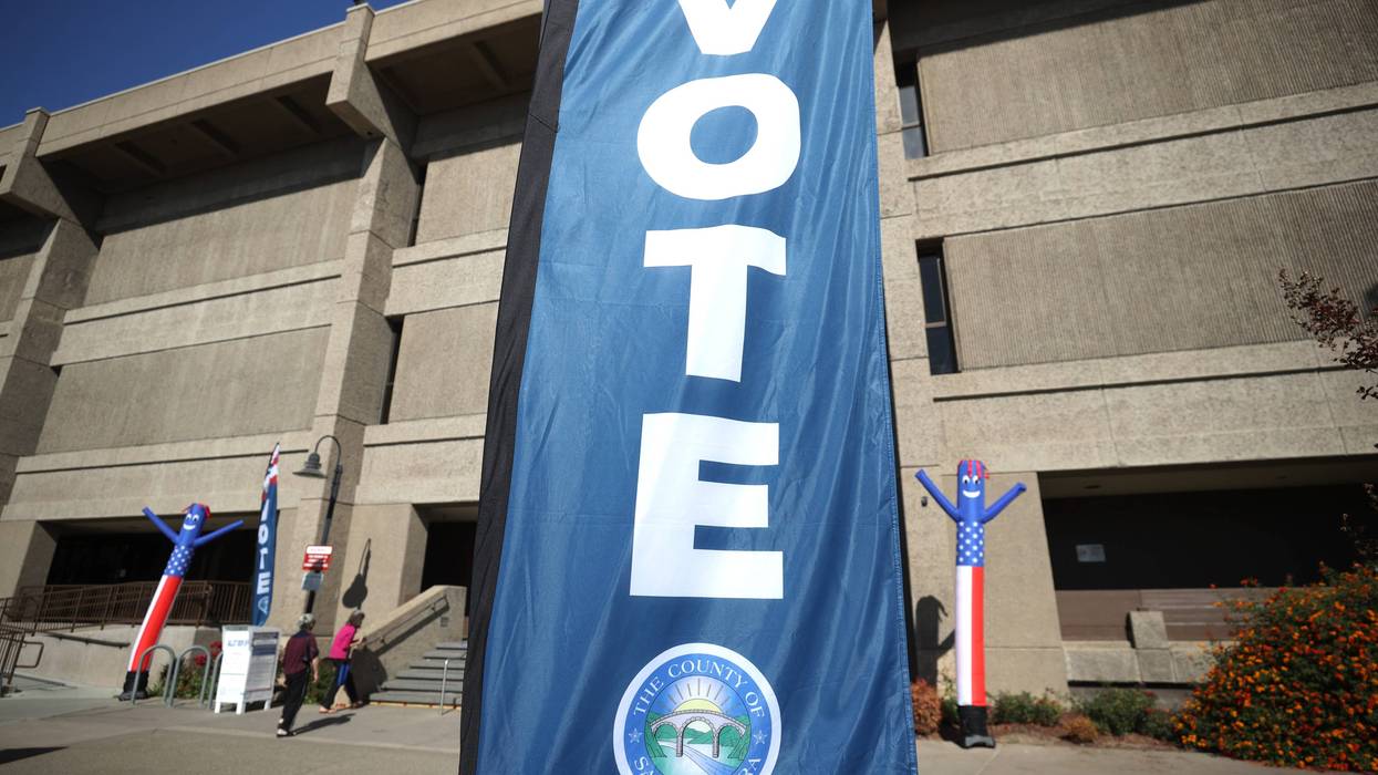 Voters arrive to cast their ballots in the California recall election at the Santa Clara County registrar of voters office on September 14, 2021 in San Jose, California.