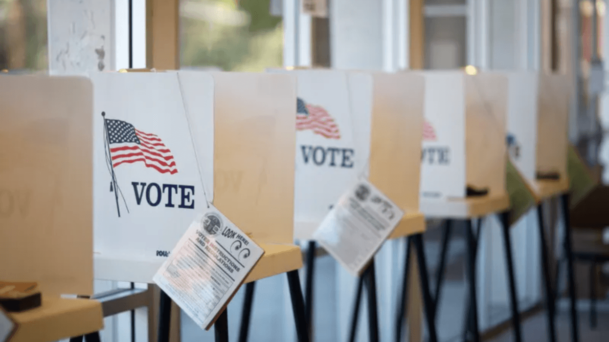 Voting booths with American flag images
