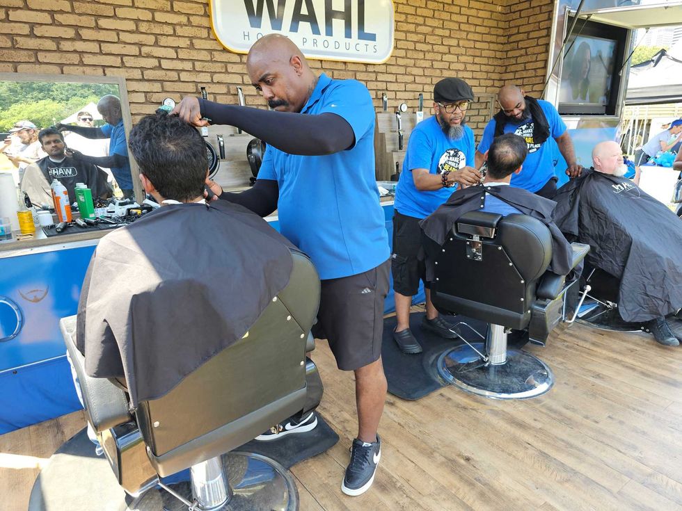 Wahl is donating $100 to the charity Operation Warrior Wishes for every free beard trim they do at the mobile barber shop inside the NASCAR Village.
