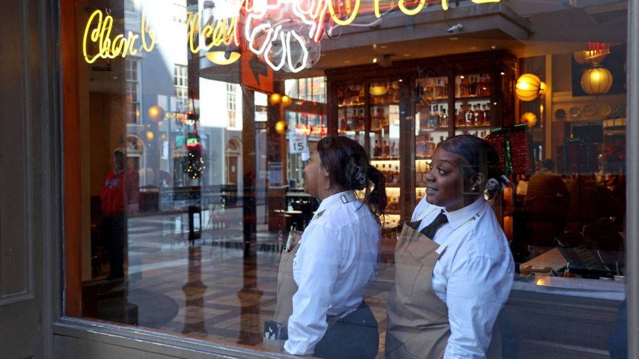 wait staff looking out of window