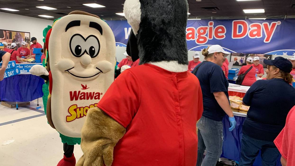 Wally the goose greets Shorti for a long day of sandwich-making.