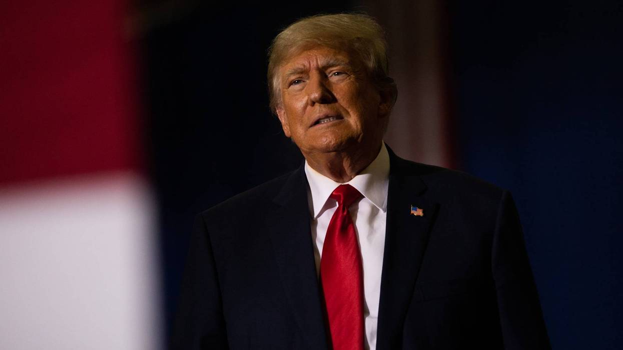 WARREN, MI - OCTOBER 01: Former President Donald Trump gets ready to speak during a Save America rally on October 1, 2022 in Warren, Michigan. Trump has endorsed Republican gubernatorial candidate Tudor Dixon, Secretary of State candidate Kristina Karamo, Attorney General candidate Matthew DePerno, and Republican businessman John James ahead of the November midterm election.