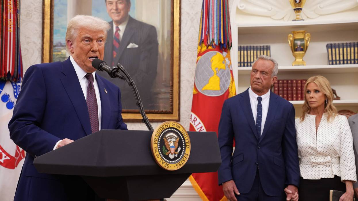WASHINGTON, DC - FEBRUARY 13: U.S. President Donald Trump, accompanied by Robert F. Kennedy Jr. and his wife Cheryl Hines, speaks before Kennedy is sworn in as Secretary of Health and Human Services in the Oval Office at the White House on February 13, 2025 in Washington, DC. Kennedy, who faced criticism for his past comments on vaccine, was confirmed by the Senate 52 to 48. Former Senate Republican Leader Mitch McConnell (R-KY) was the only Republican to vote against him.