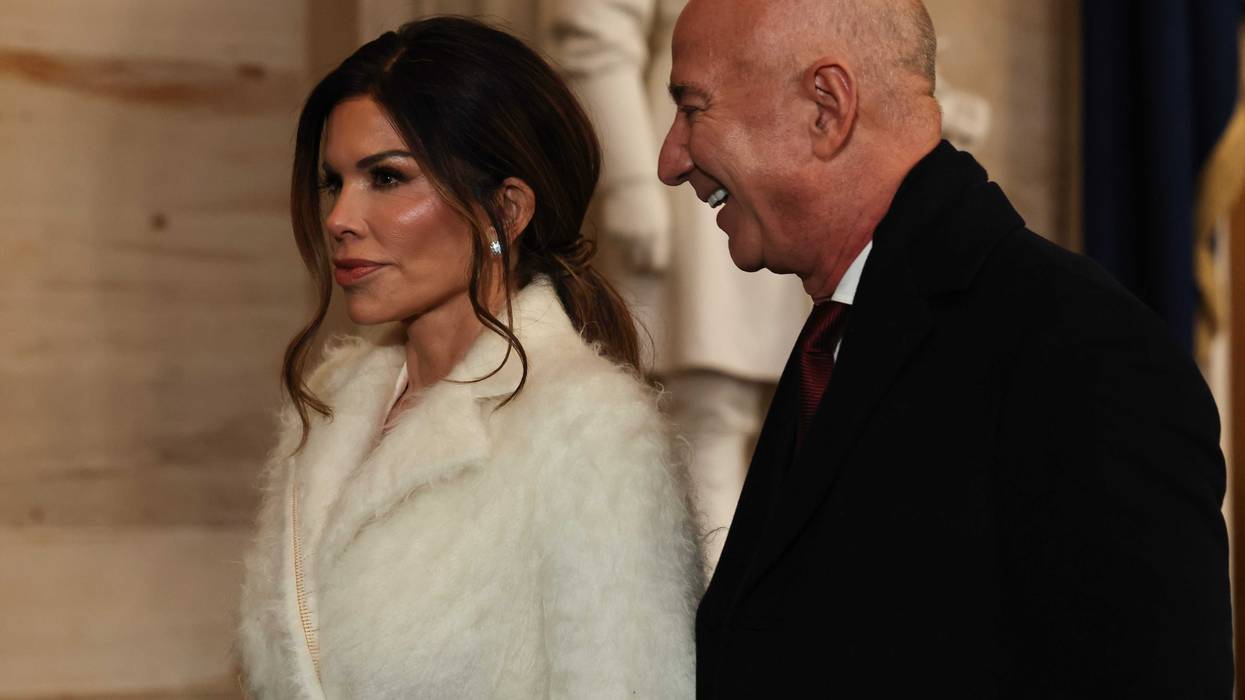 WASHINGTON, DC - JANUARY 20: Founder of Amazon and Blue Origin Jeff Bezos and his fiance Lauren Sanchez depart inauguration ceremonies in the Rotunda of the U.S. Capitol on January 20, 2025 in Washington, DC. Donald Trump takes office for his second term as the 47th president of the United States. (Photo by Chip Somodevilla/Getty Images)