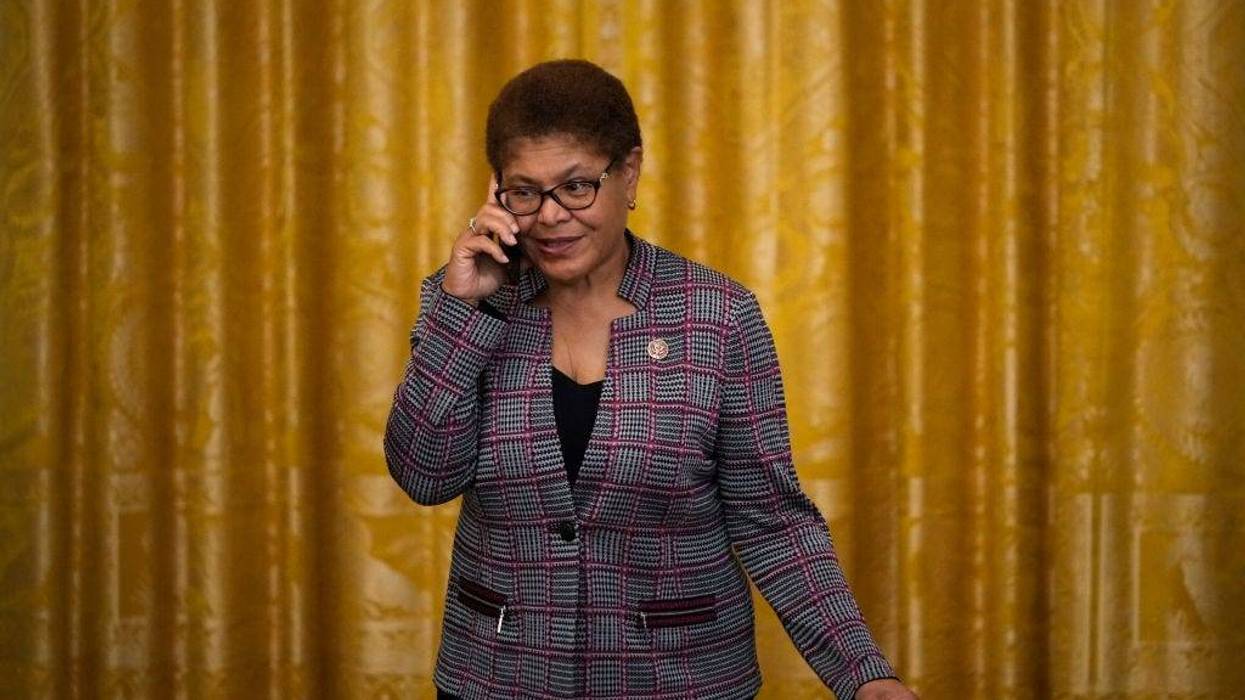 WASHINGTON, DC - JUNE 17: Rep. Karen Bass (D-CA) speaks on the phone before U.S. President Joe Biden signs the Juneteenth National Independence Day Act into law in the East Room of the White House on June 17, 2021 in Washington, DC. The Juneteenth holiday marks the end of slavery in the United States and the Juneteenth National Independence Day will become the 12th legal federal holiday — the first new one since Martin Luther King Jr. Day was signed into law in 1983. (Photo by Drew Angerer/Getty Images)