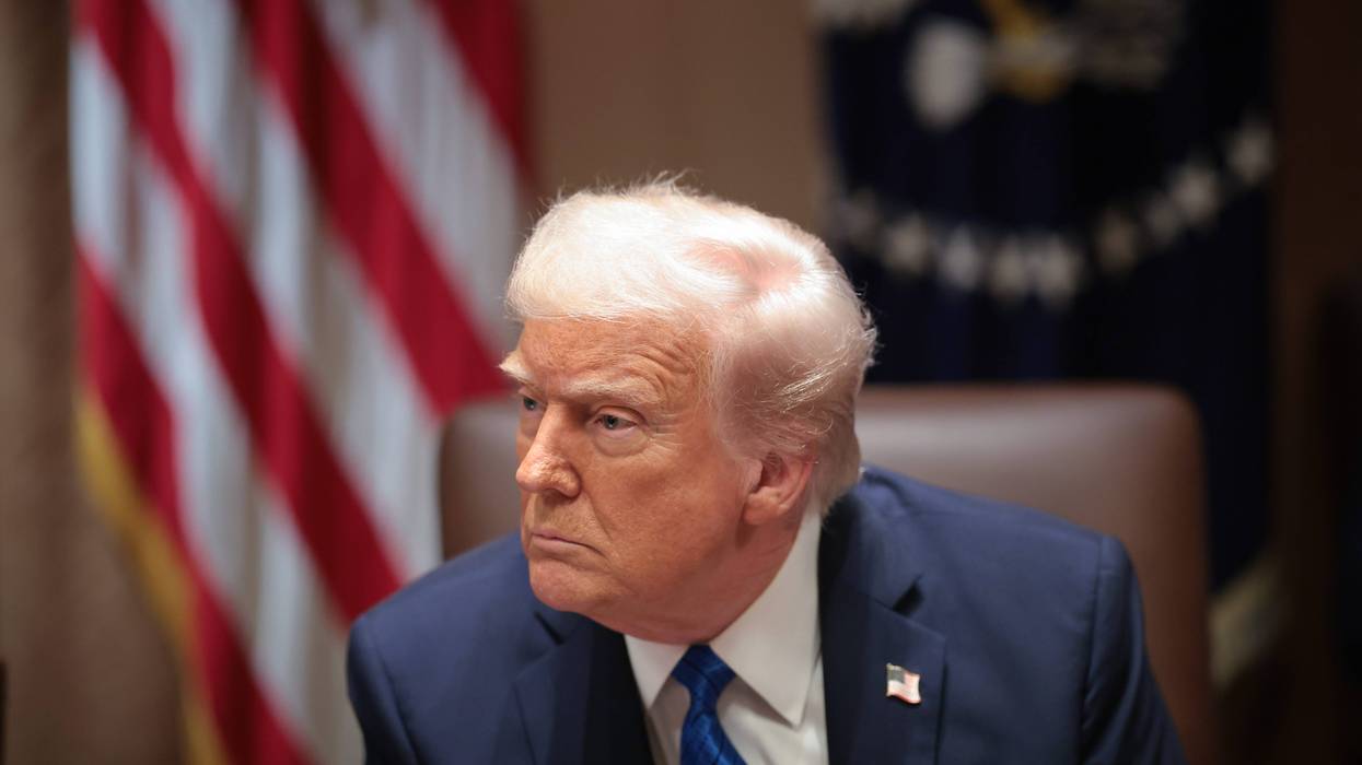 WASHINGTON, DC - MARCH 25: U.S. President Donald Trump listens to a reporter's question during an Ambassador Meeting in the Cabinet Room of the White House on March 25, 2025 in Washington, DC. During the meeting, Trump answered questions from reporters on the news that Jeffrey Goldberg, the editor-in-chief of The Atlantic magazine, was accidentally added to a Signal group chat of top administration officials, where highly sensitive national security information was discussed. (Photo by Win McNamee/Getty Images)