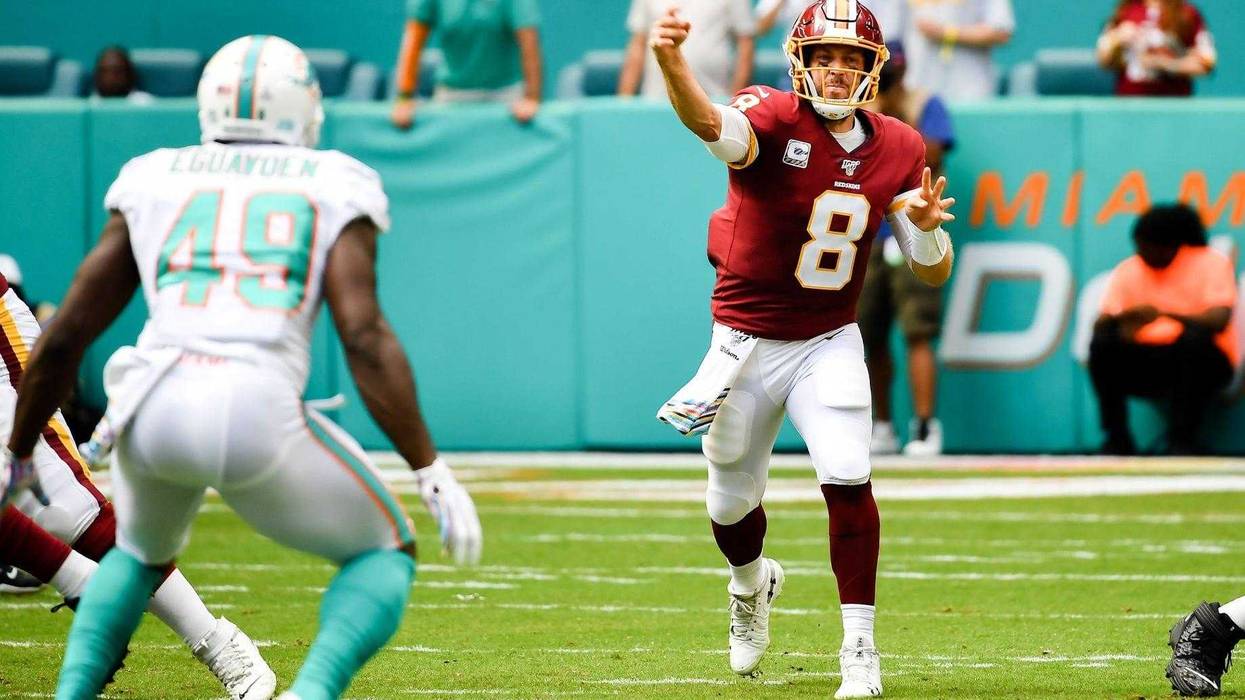 Washington Redskins quarterback Case Keenum (8) against the Miami Dolphins during the first half at Hard Rock Stadium.