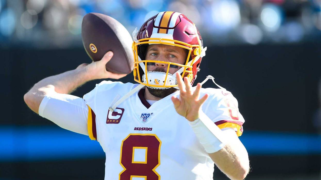 Washington Redskins quarterback Case Keenum (8) warms up in the second quarter at Bank of America Stadium.