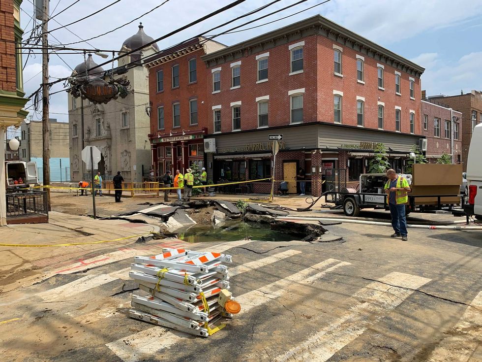 Water Department crews blocked off the Bainbridge Street section where the water main break left a large hole in the street.