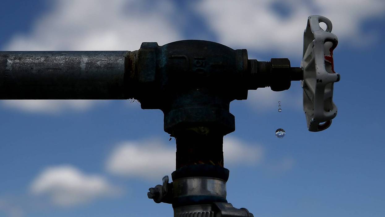 Water drips from a faucet at the Dublin San Ramon Services District (DSRSD) residential recycled water fill station on April 8, 2015 in Pleasanton, California.