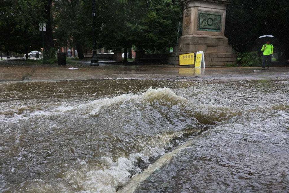 Water is seen running along the road at the Southwest entrance of Prospect Park amid a coastal storm on Sept. 29, 2023 in the Flatbush neighborhood of Brooklyn.