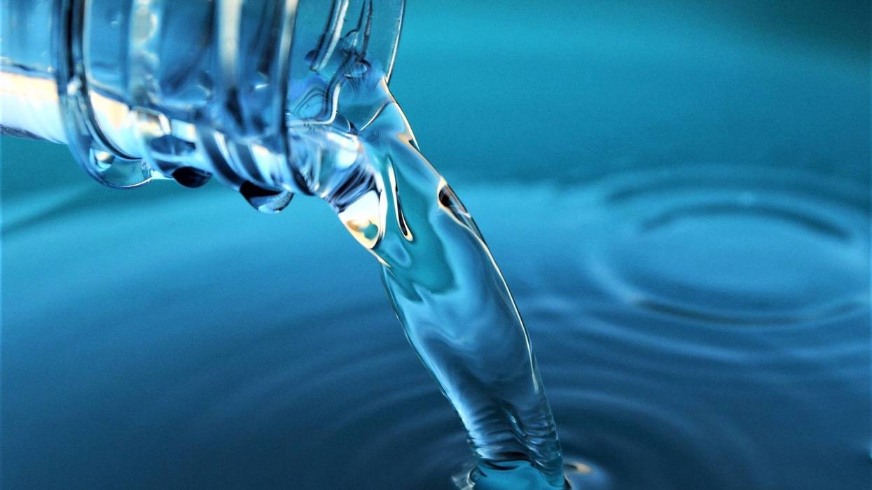 Water pouring out of a bottle