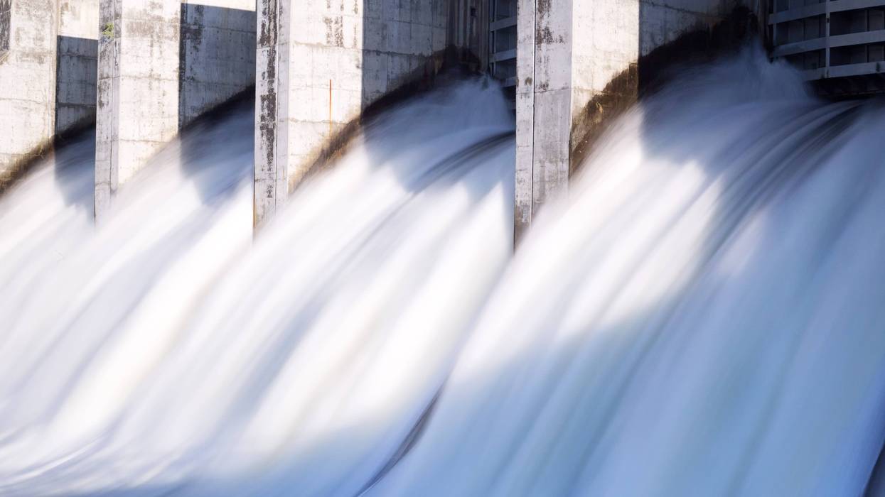 Water rushing out of hydro dam